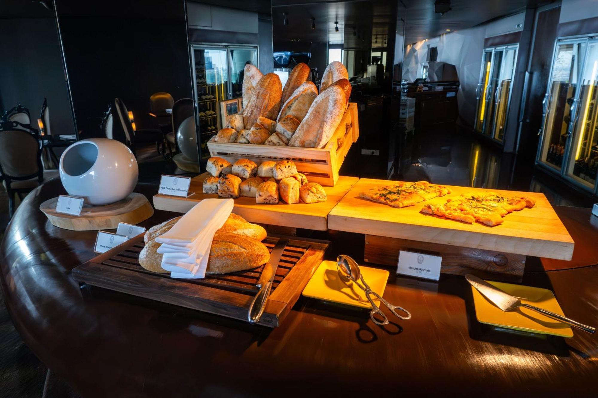 Hotel Lebua At State Tower Bangkok Esterno foto Bread and pastry selection at a buffet